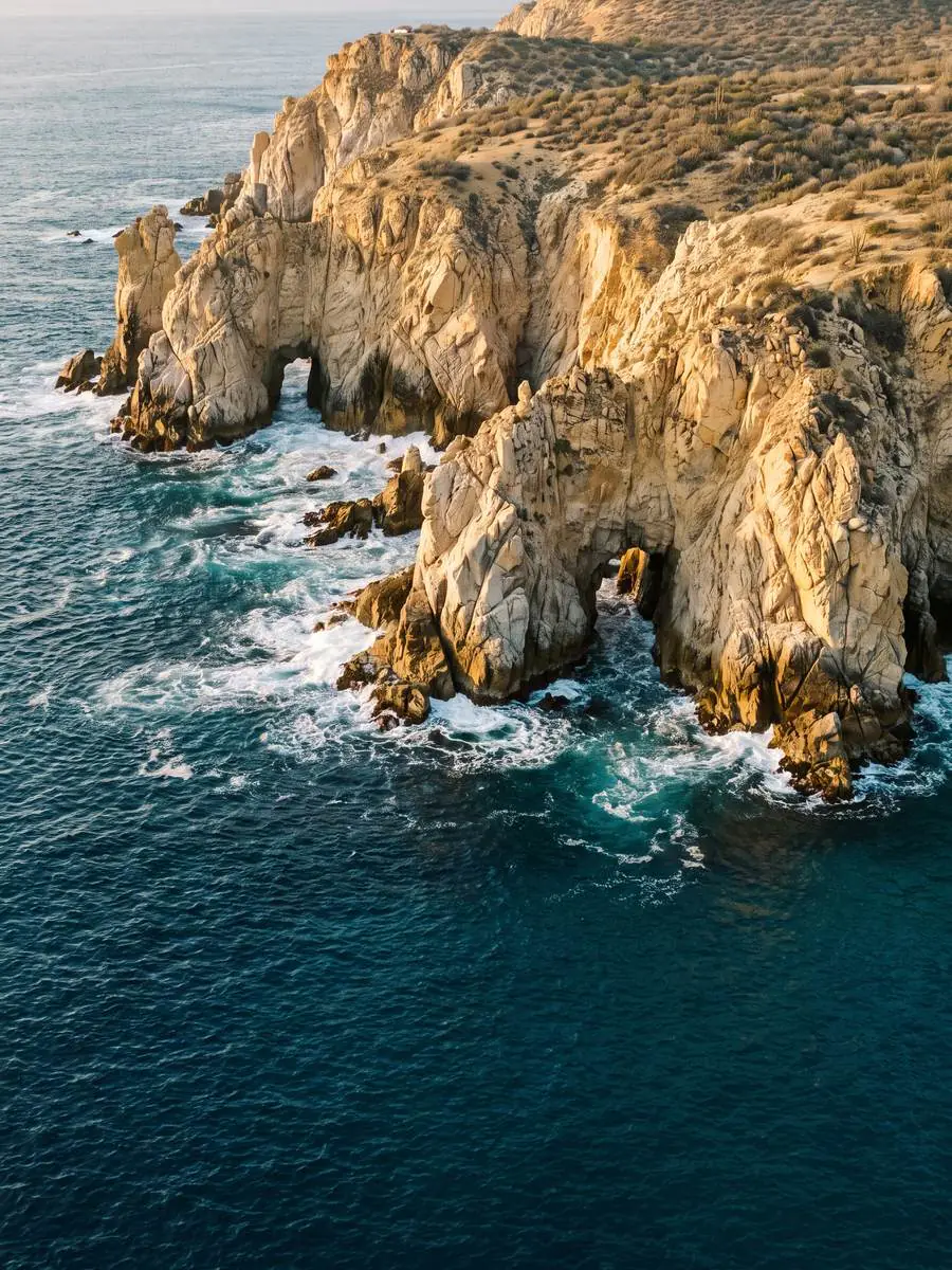 Coastal cliffs and resort coastline at Los Cabos, Mexico